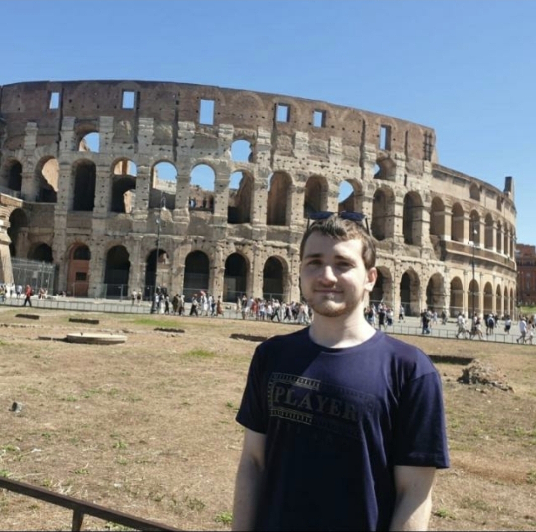 Arik visiting the Colosseum in Rome